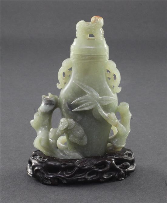 A Chinese celadon jade vase and cover, late 19th / early 20th century,